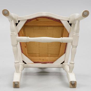 A Rococo style dining table and twelve chairs, KA Roos, Helsingborg, modern production.