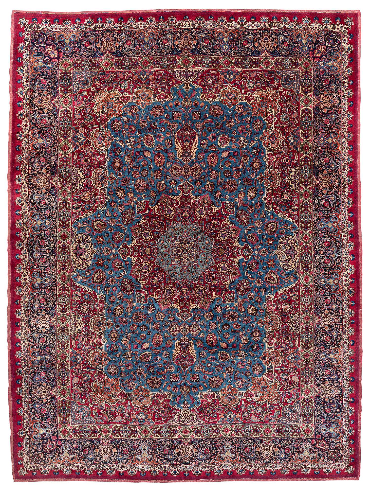 A Mashad carpet, signed Saber, c. 468 x 348 cm.