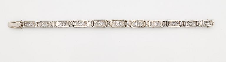 A bracelet set with old and eight cut diamonds.