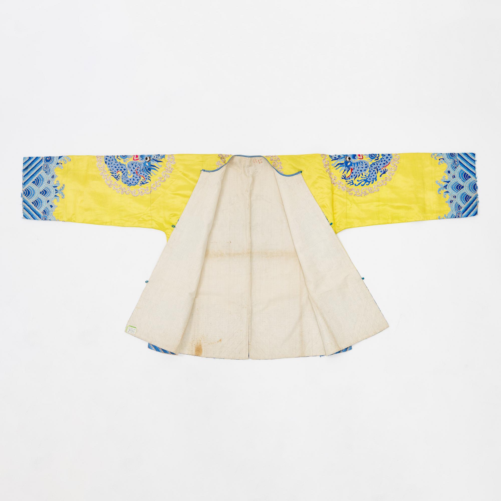 A yellow-ground embroidered silk robe, 20th century.