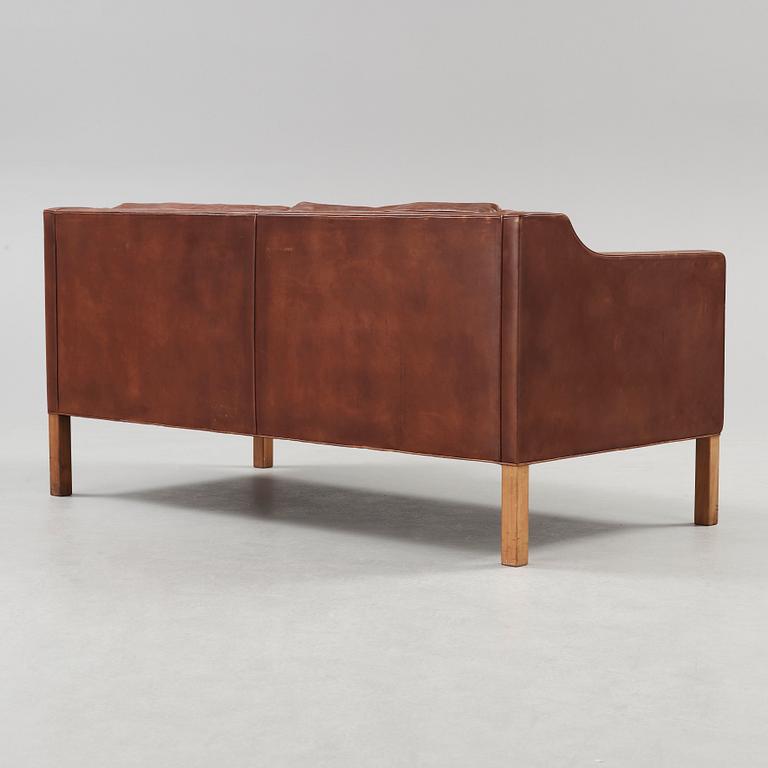 A Børge Mogensen two-seated dark brown leather sofa, Fredericia Stolefabrik, Denmark.