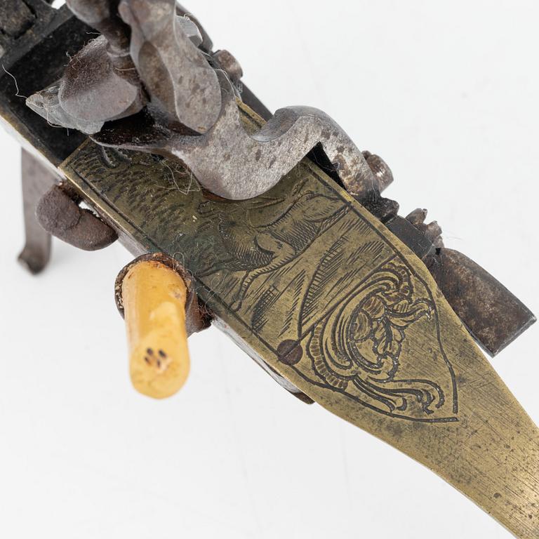 A flintlock lighter 18th Century.