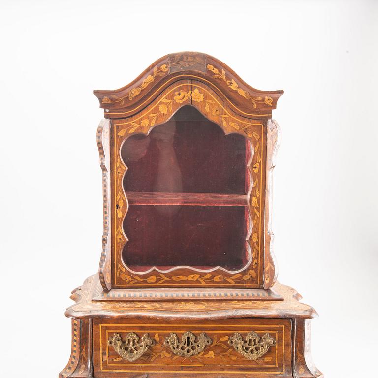 A Louis XV-style miniature cabinet around 1900.
