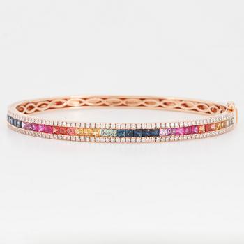 Multi coloured sapphire and brilliant-cut diamond bangle.