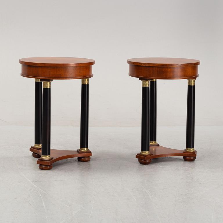 A pair of empire style side tables from Fiorini Furniture, Italy.