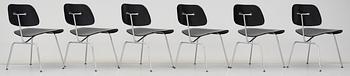 A set of six Charles & Ray Eames 'DCM' chairs by Vitra.