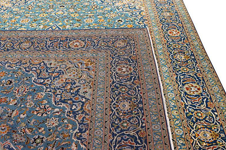 A so called Royal Kashan carpet, signed Isfahanian, c. 407 x 310 cm.