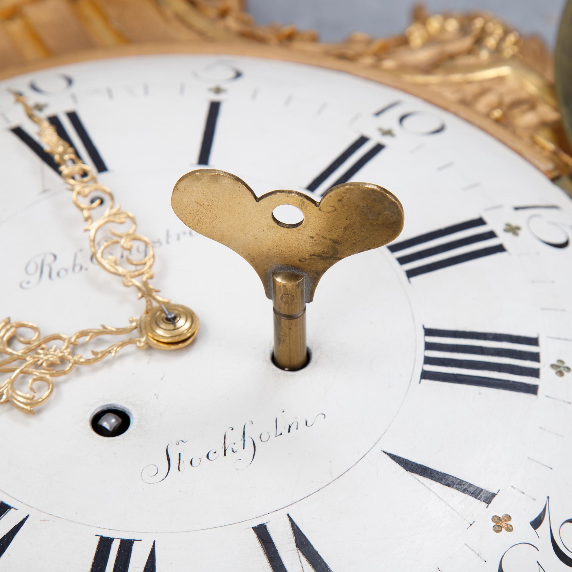 A gustavian style wall clock, signed Rob. Engström, Stockholm. First half of the 20th century.