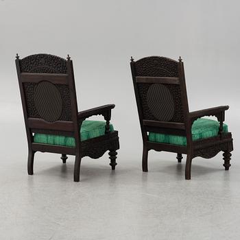 A pair of Angloindian carved chairs, India, 19th century, in so called 'Bombay style'.