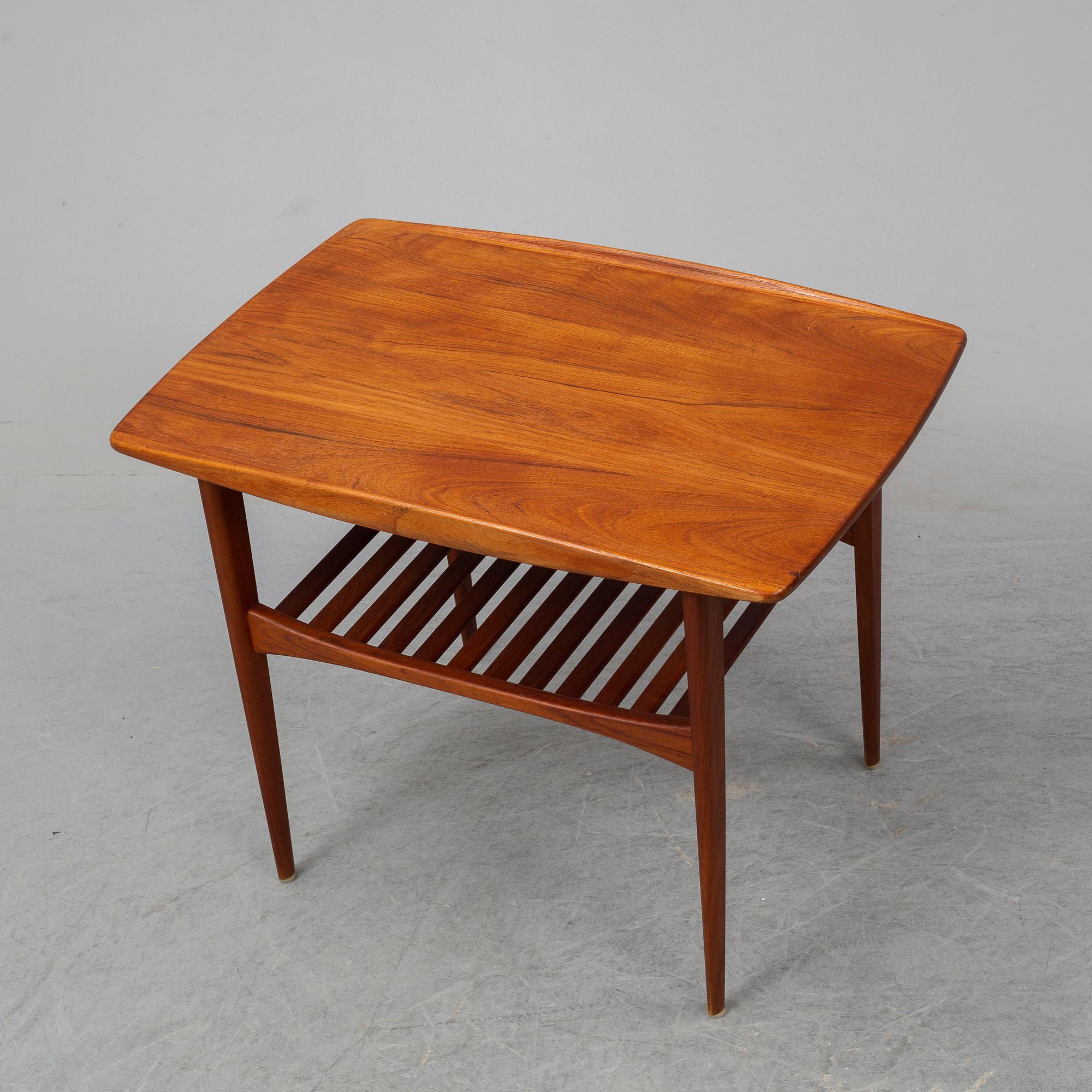 A teak coffee table, France & Daverkosen, Denmark.