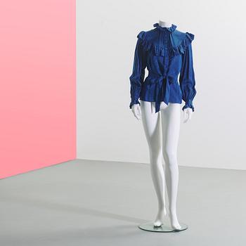 KNYTBLUS, Yves Saint Laurent.