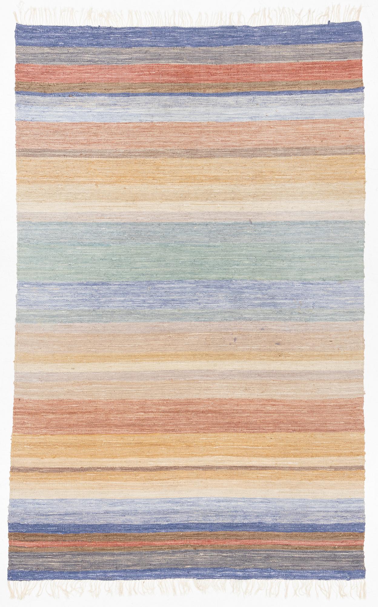 A rag rug, c. 300 x 195 cm.