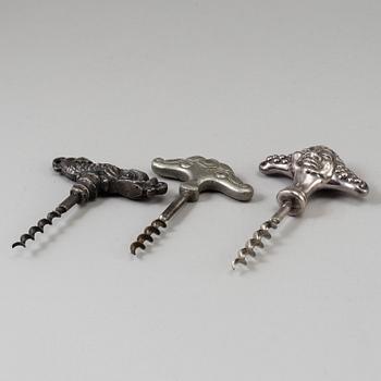 Three metal corkscrews, 1920/30.
