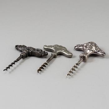 Three metal corkscrews, 1920/30.