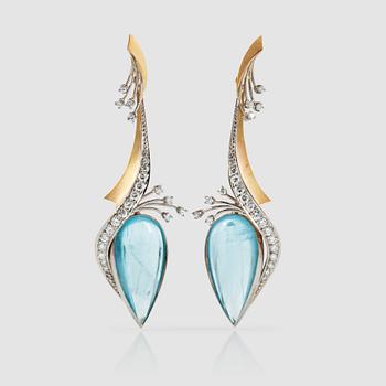 1347. A pair of cabochon-cut aquamarines and brilliant-cut diamonds. Total carat weight of diamonds circa 1.20 cts.