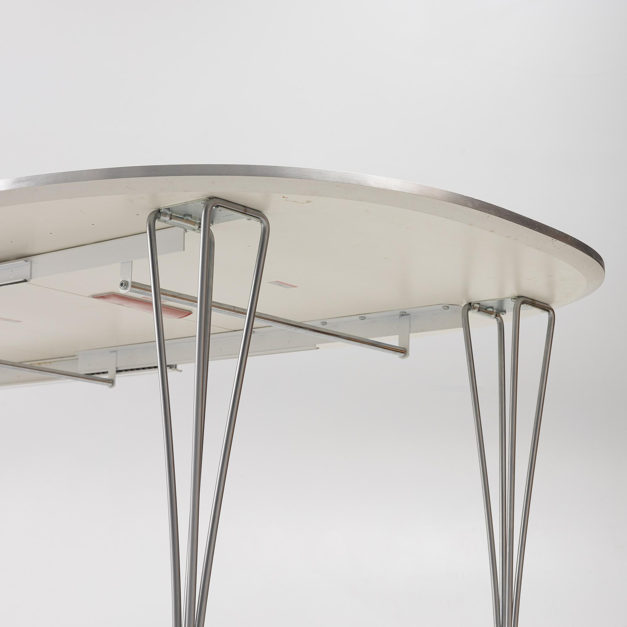 Bruno Mathsson & Piet Hein, dining table, "Superellipse", Fritz Hansen, Denmark, 2008.