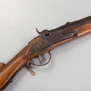 A percussion rifle from around year 1800.