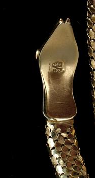 ARMRING, 18k guld. Vikt 39g.