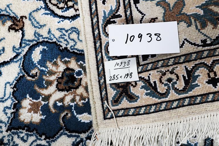 A carpet, Nain, 285 x 196 cm.