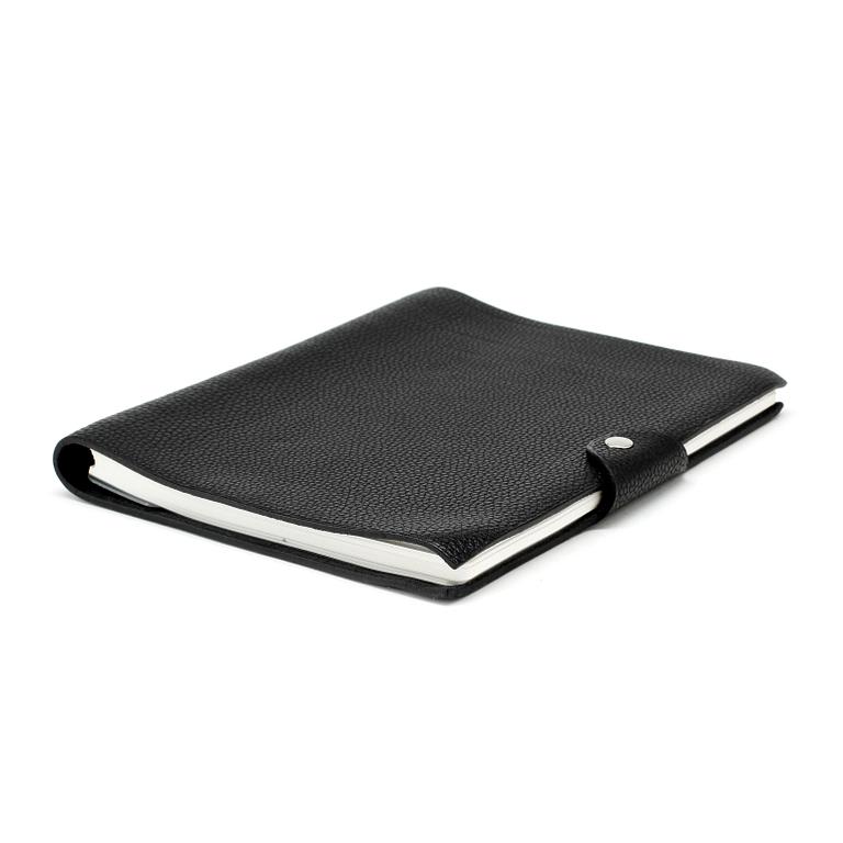 HERMÈS, a black leather notebook, "Moyen Modèle".