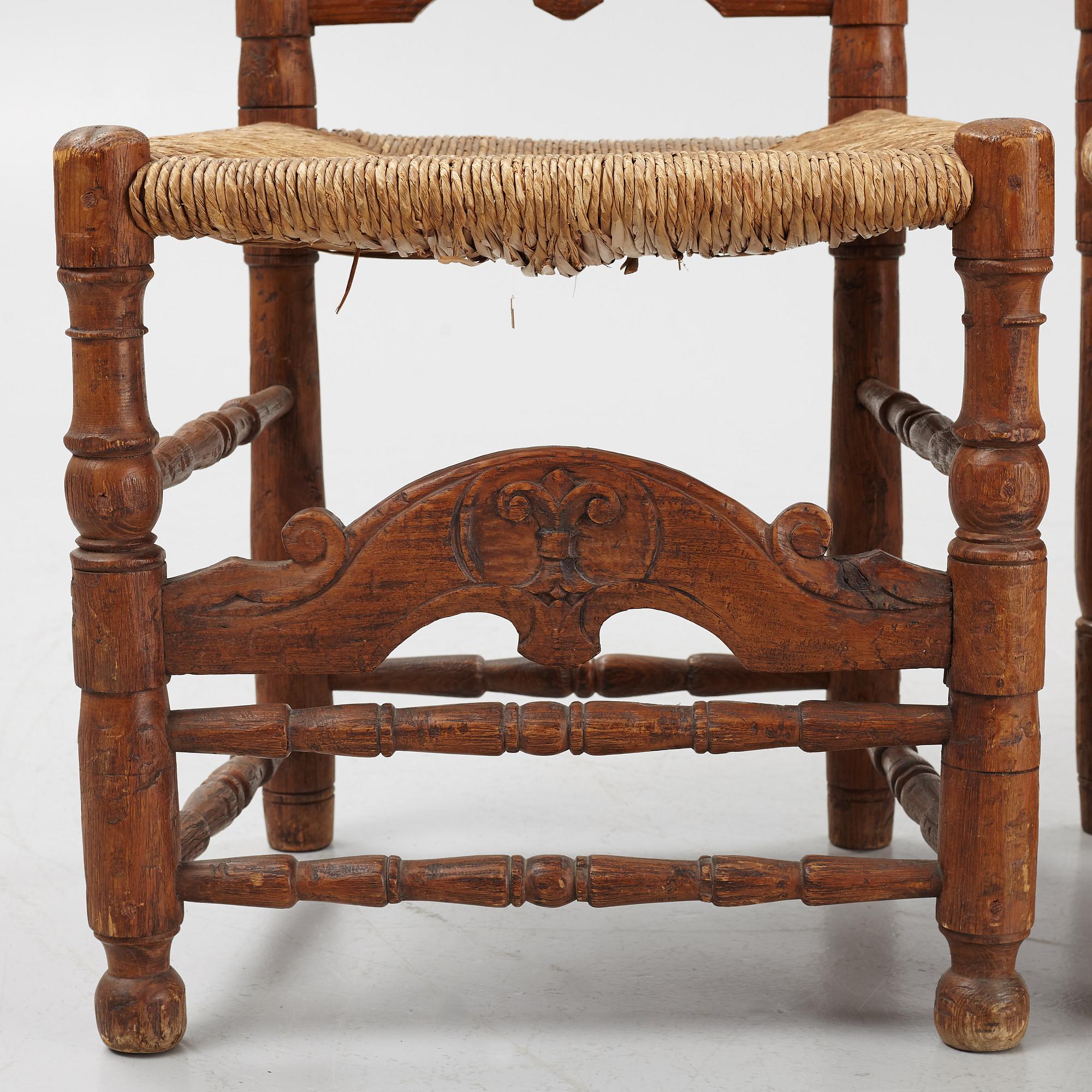 A pair of Spanish colonial style ladder-back chairs, circa 1900.