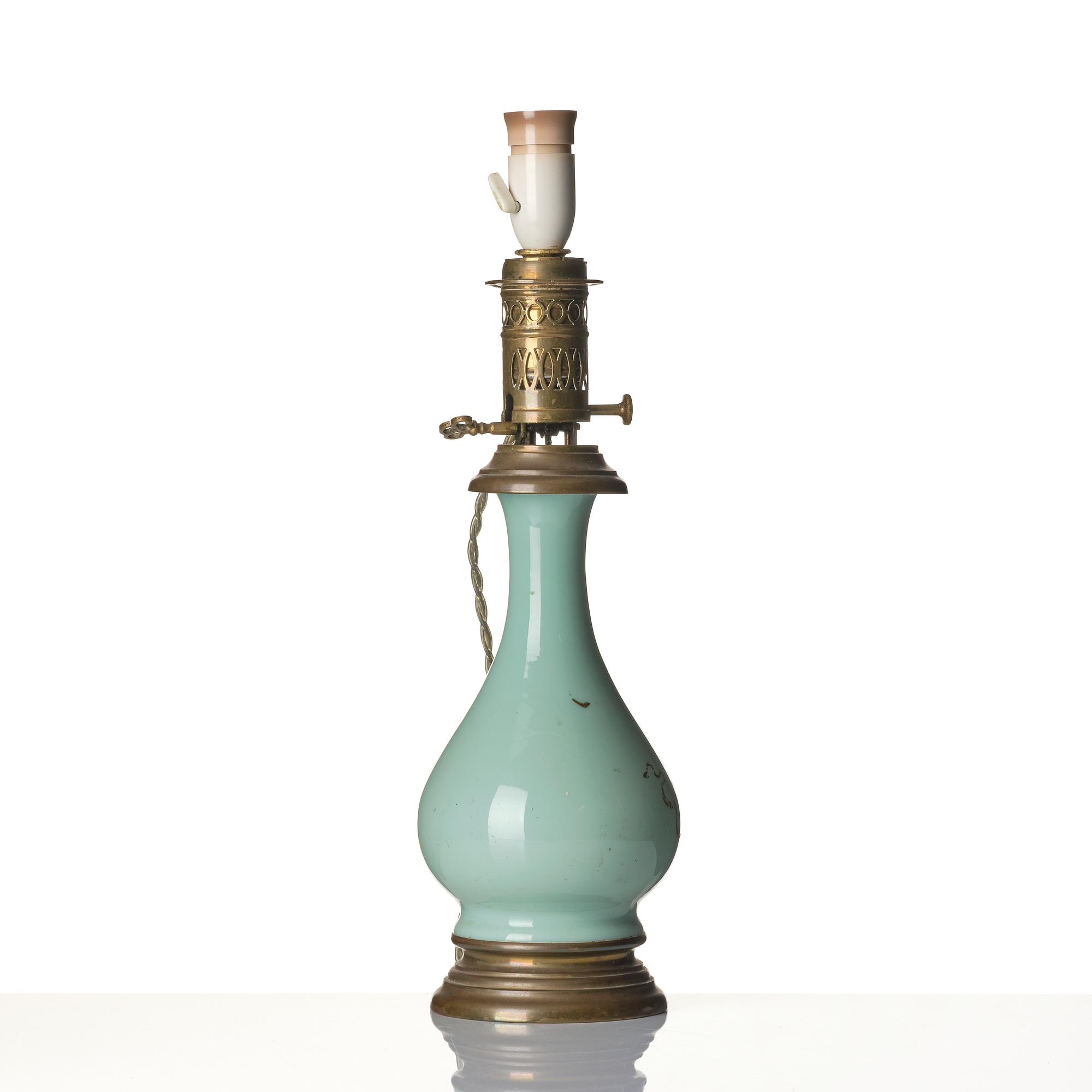 A celadon vase made into a lamp, circa 1900.