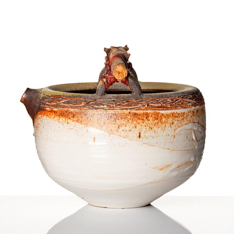 Iskandar Jalil, a stoneware vessel with wooden handle, Singapore 1970s-80s.