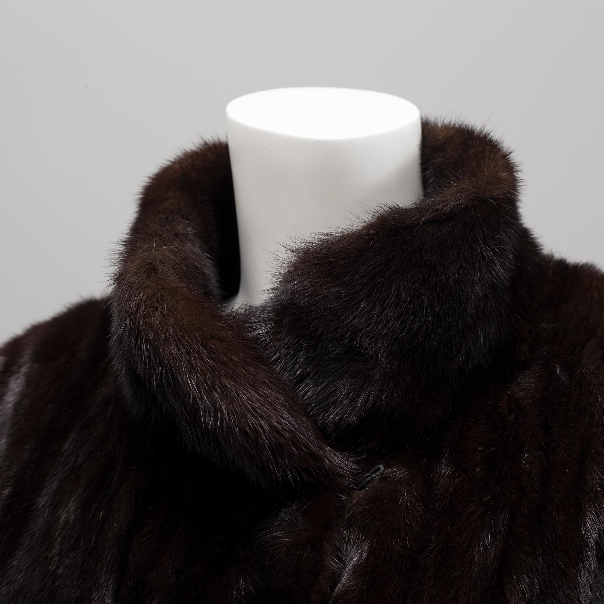 A mink fur coat from Saga Mink, Karl Lindblom, circa size M.