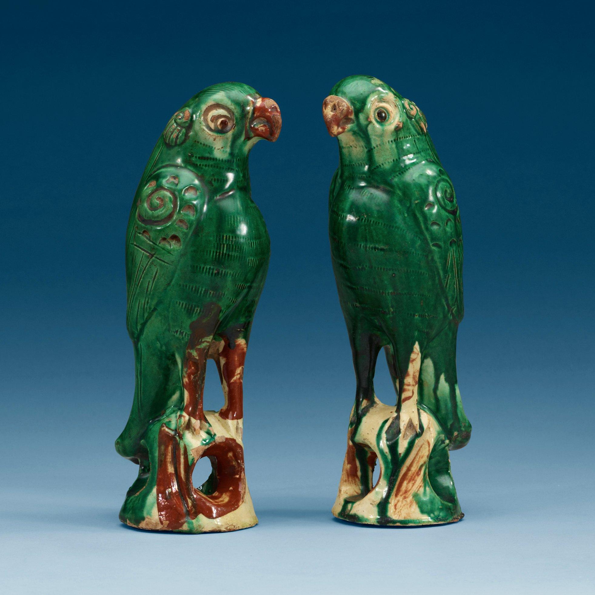 A set of two green glazed falcons, China.