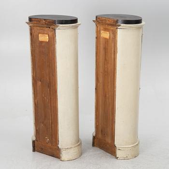 A pair of column cabinets, 19th century.
