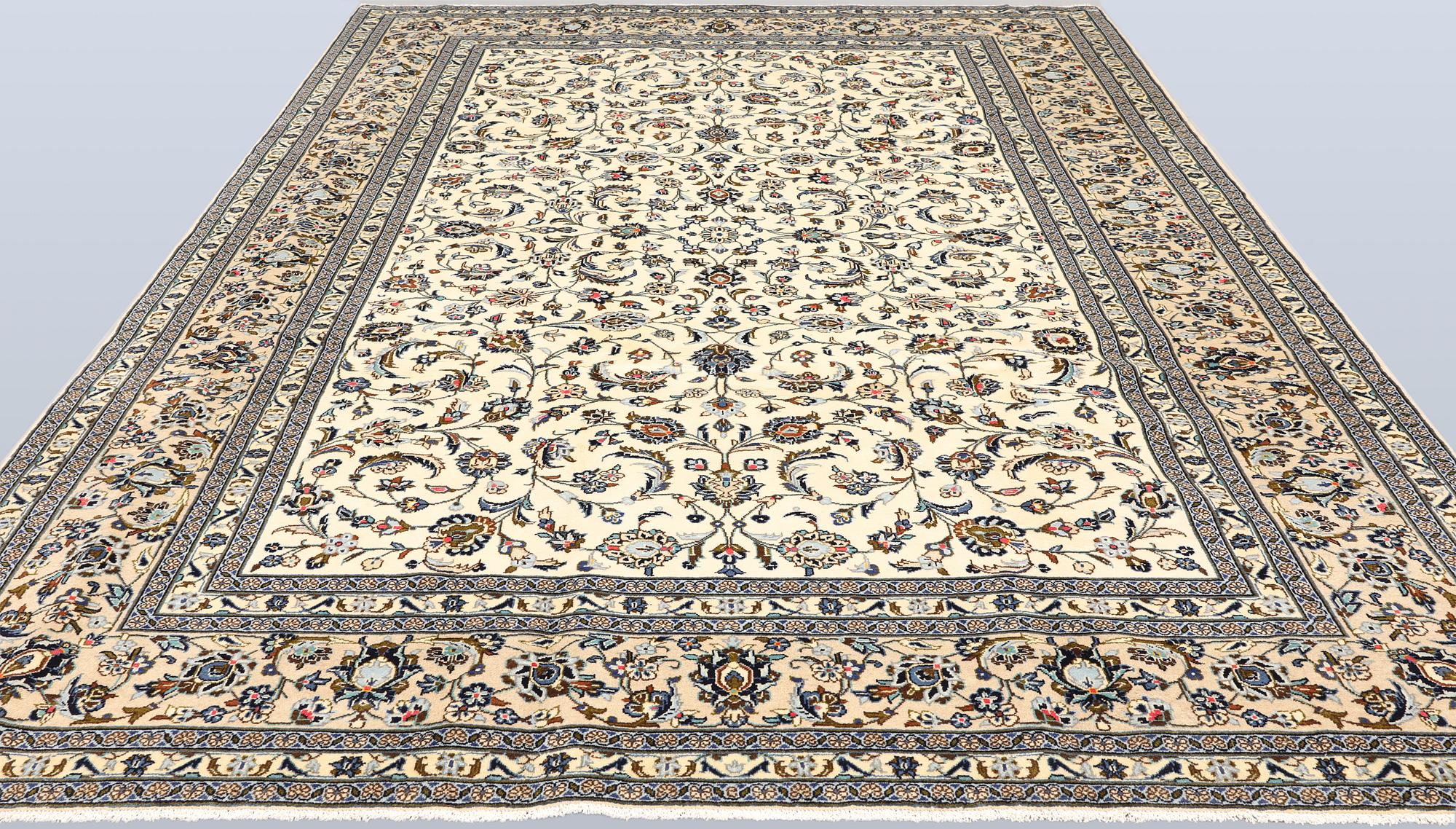 A Keshan carpet, c. 365 x 250 cm.
