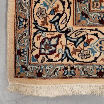 A carpet, Old Nain, part silk, ca 285 x 198 cm.