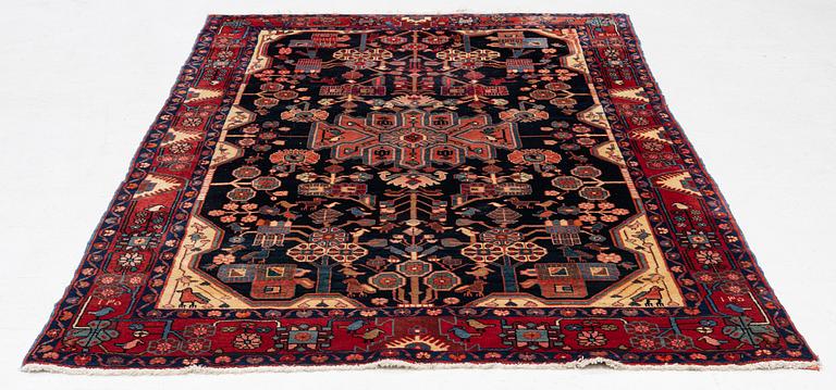 A oriental rug, c. 245 x 150 cm.