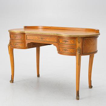 A Louis XVI style desk, early 20th Century.