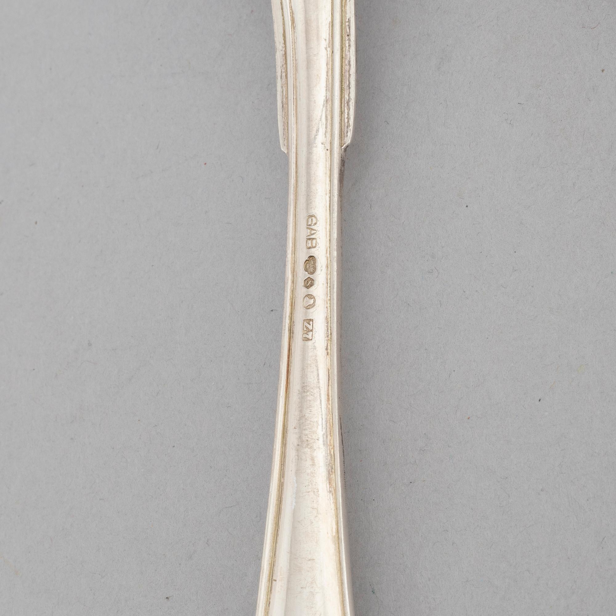 A 29 piece silver cutlery, model 'Svensk spets' and similar model, inclusing GAB, Stockholm, 1020-1931.