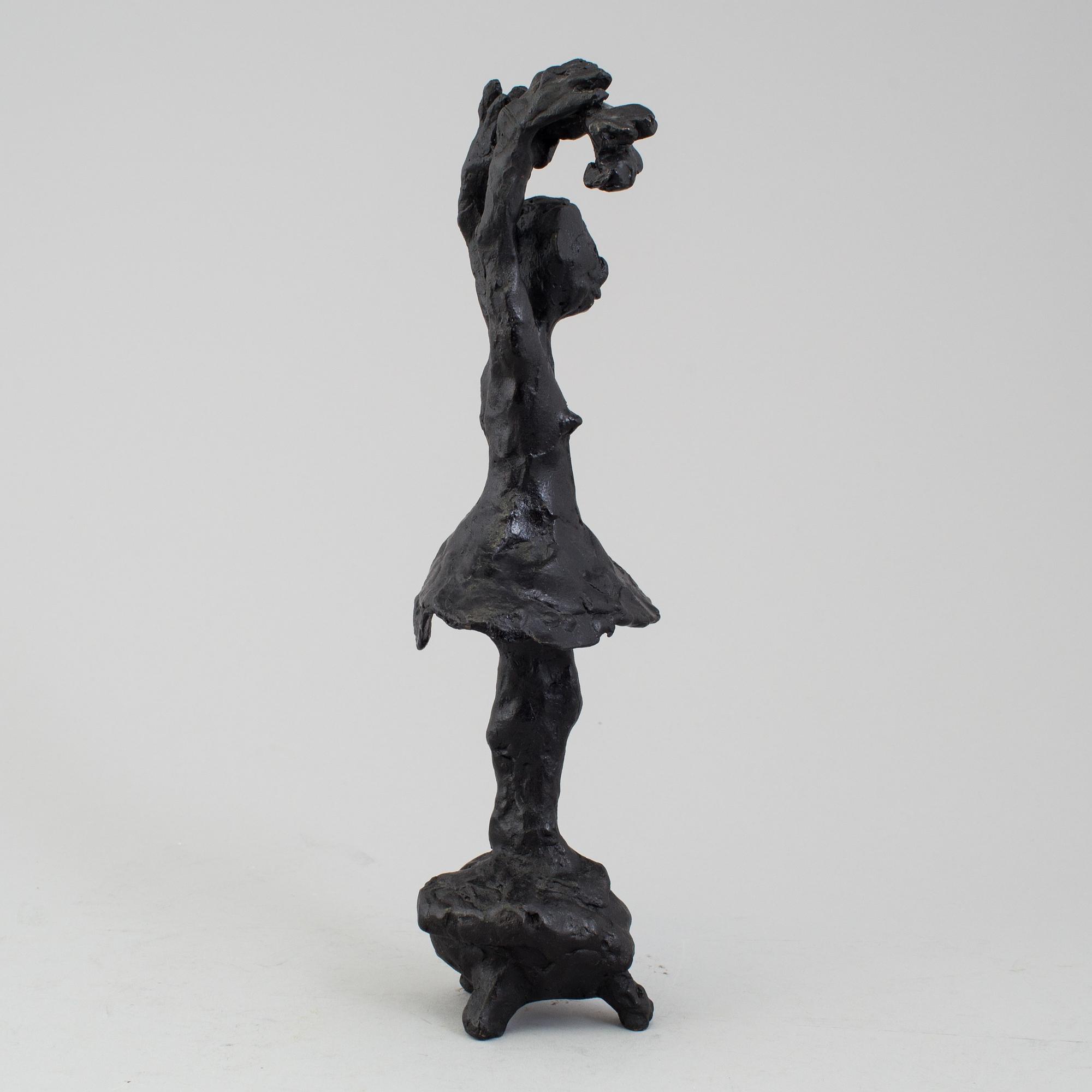 A bronze sculpture by Karin Lind, not signed.