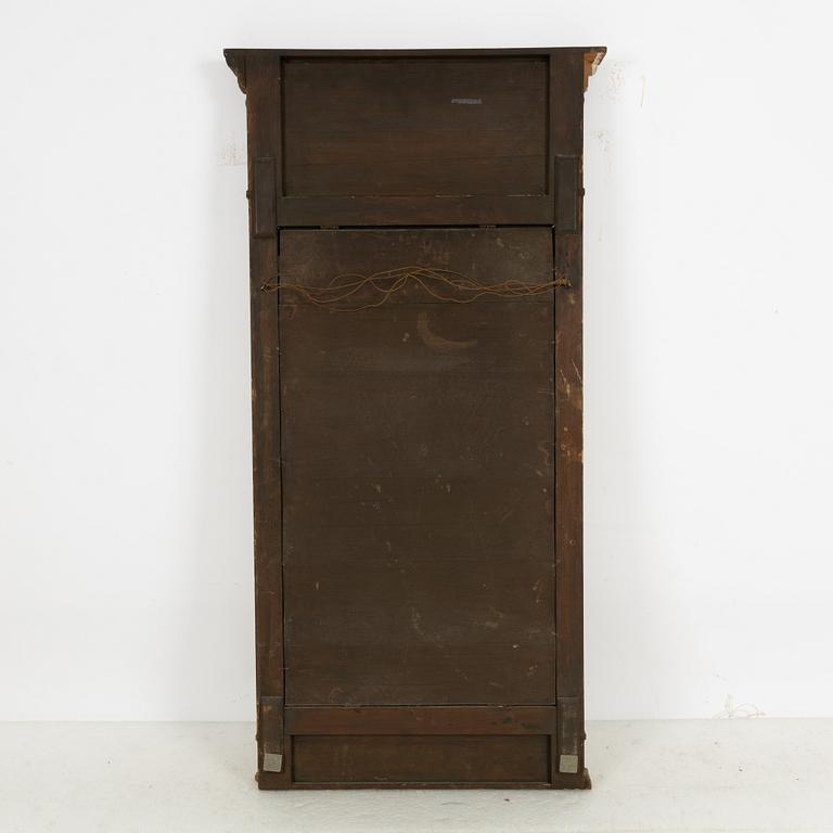 A Gustavian style mirror, circa 1900.