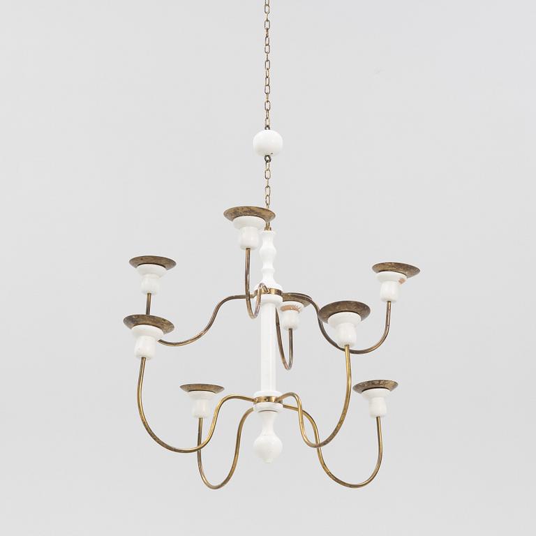 Josef Frank, a model '2586' wodden and brass chandelier, Firma Svenskt Tenn.