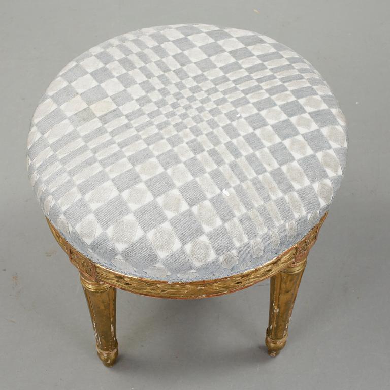 A gilded gustavian stool by E Levin.