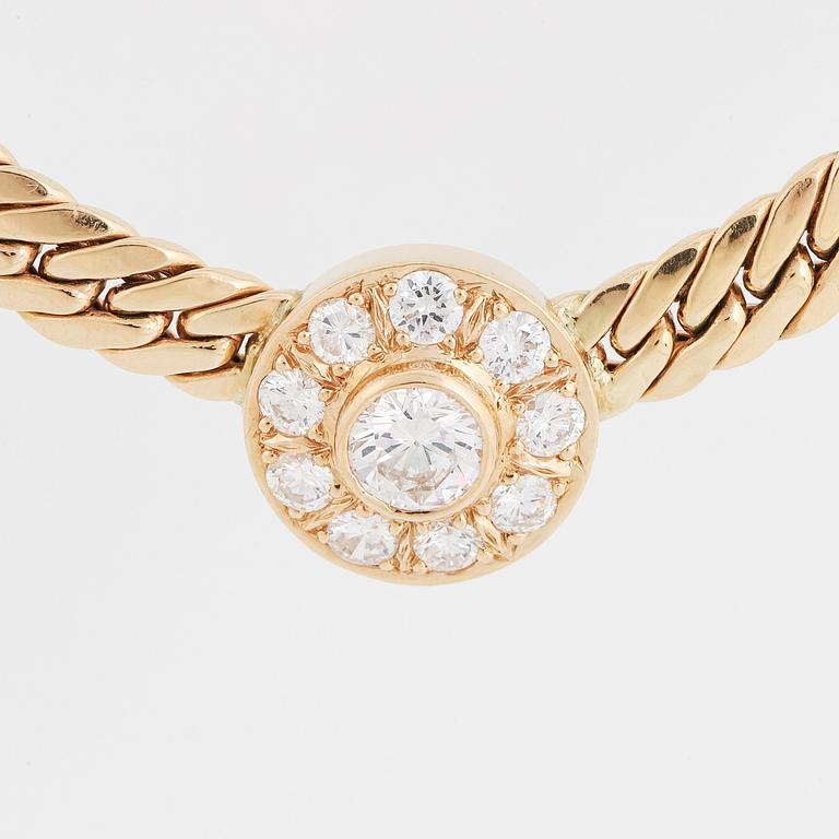 18K gold and brilliant-cut diamond necklace.