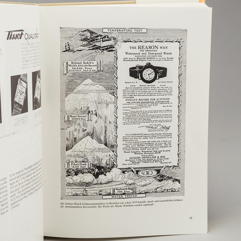 A set of 5 watch books.