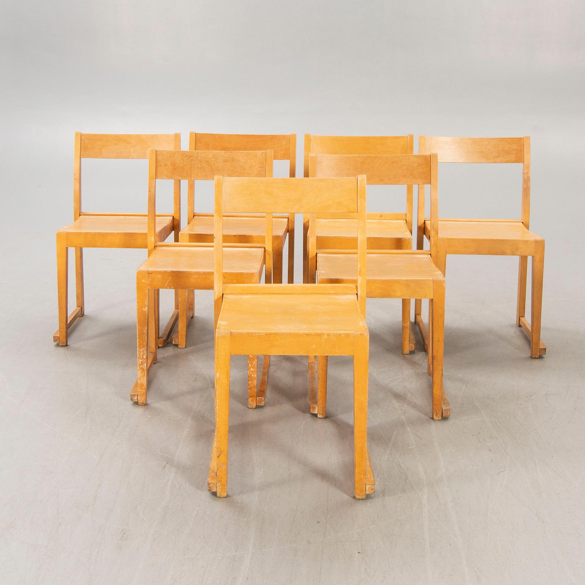 A st of seven Sven Markelius Orkesterstolen birch chairs mid 1900s.