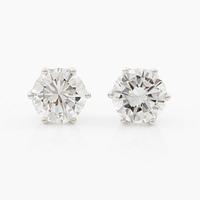 Earrings, single-stone earrings in 18K white gold with brilliant-cut diamonds, accompanied by IGI report.