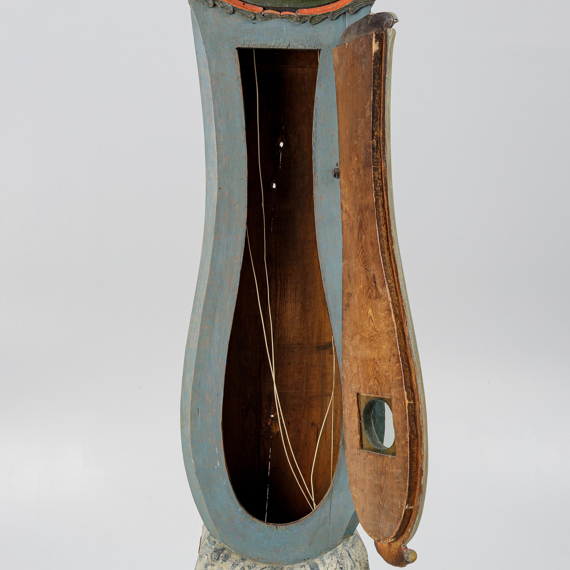 A Swedish folk art longcase clock from Hälsingland, dated 1812.