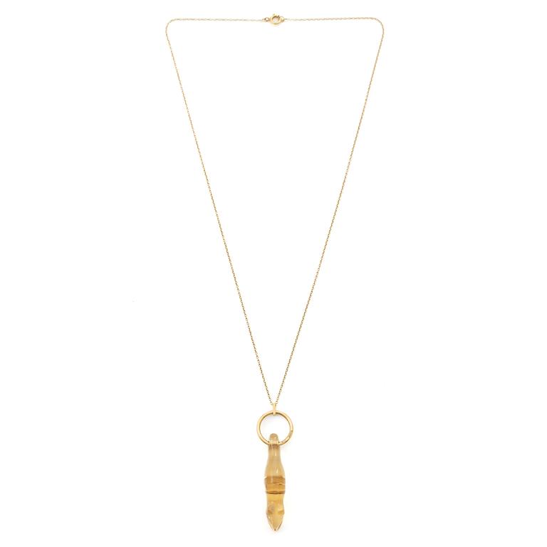 Necklace, 17K gold with citrine in the form of a sweet wrapper.