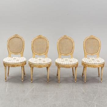 A set of four Louis XVI-style chairs from the early 20th century.