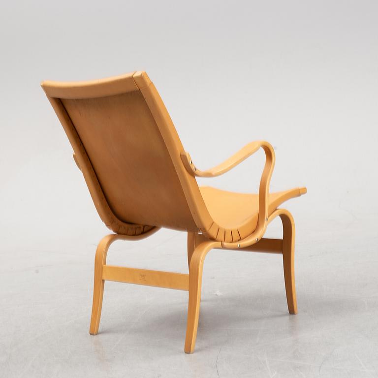 An 'Eva' lazy chair designed by Bruno Mathsson in 1941.