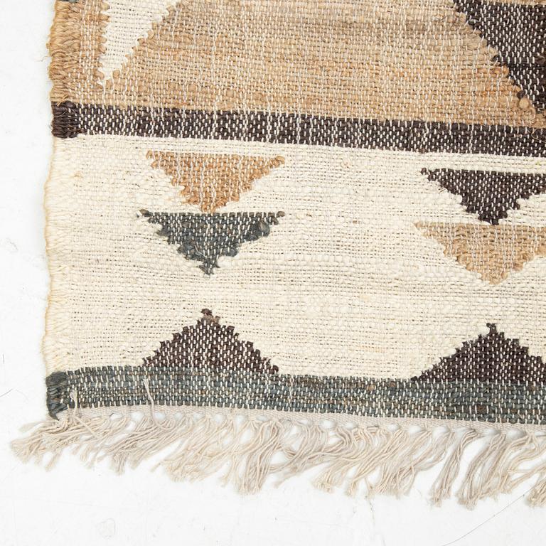 An Indian flat weave carpet,  approx. 287 x 174 cm.