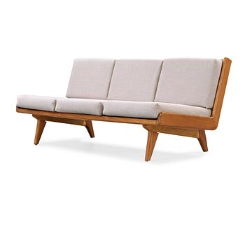 A Carl Gustaf Hiort af Ornäs walnut sofa, Finland 1950's.