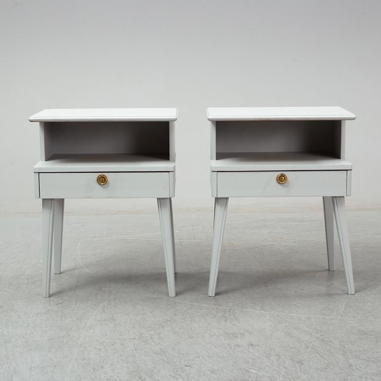 A pair of mid 20th century bedside tables.